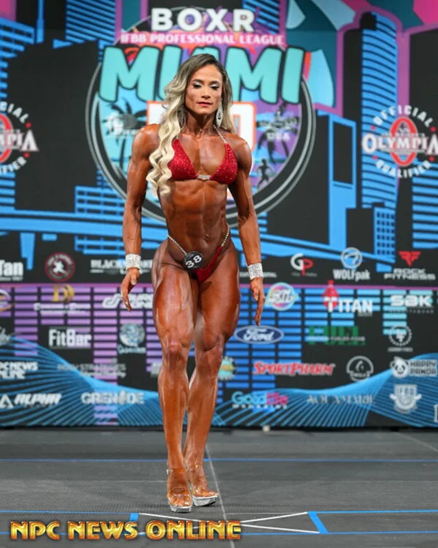 Red-on-Red Full Crystal competition bikini modeled — Stage-Ready Swarovski® crystal design, NPC and IFBB ready