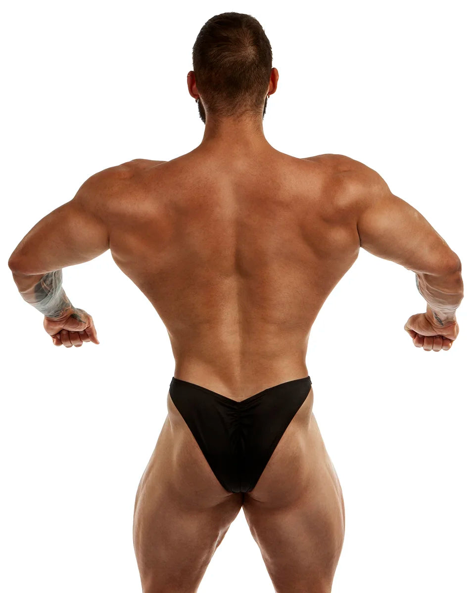 Bodybuilding Trunks in matte black lycra, back view showing Rio cut gather, handcrafted in Clearwater Florida