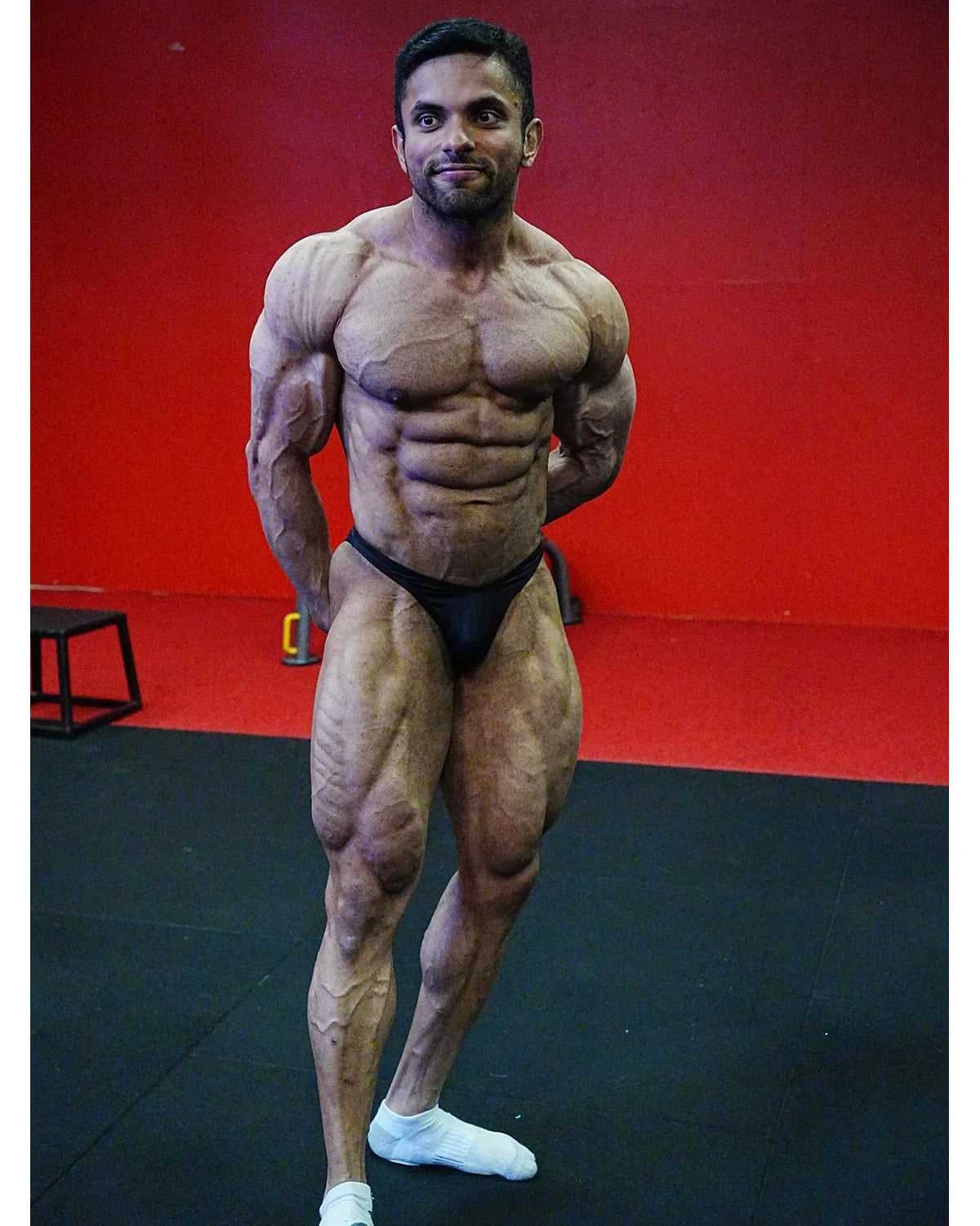 Bodybuilding trunks, custom Ratan, front pose. Made in America.