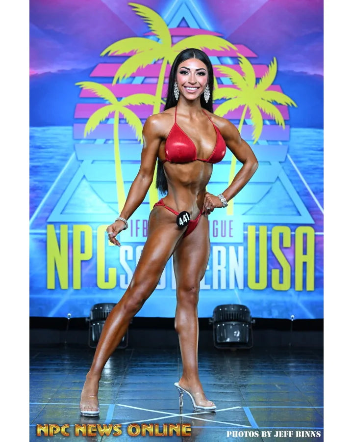 Fit Model Pro Lauren, red mist fabric, front pose. 