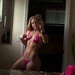 Customer Ryann in her pink posing bikini from our grab bag special